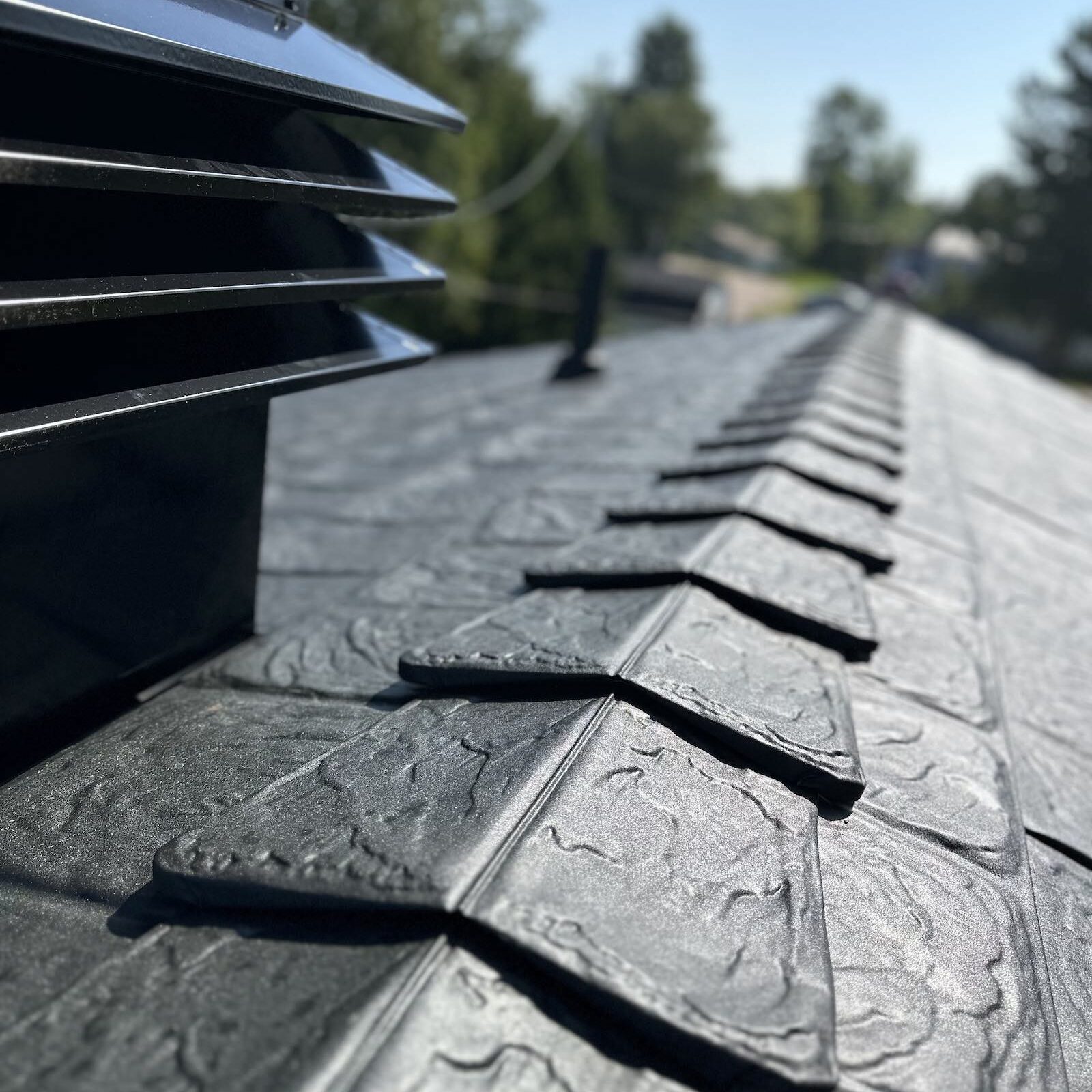 close up of dark grey metal roof