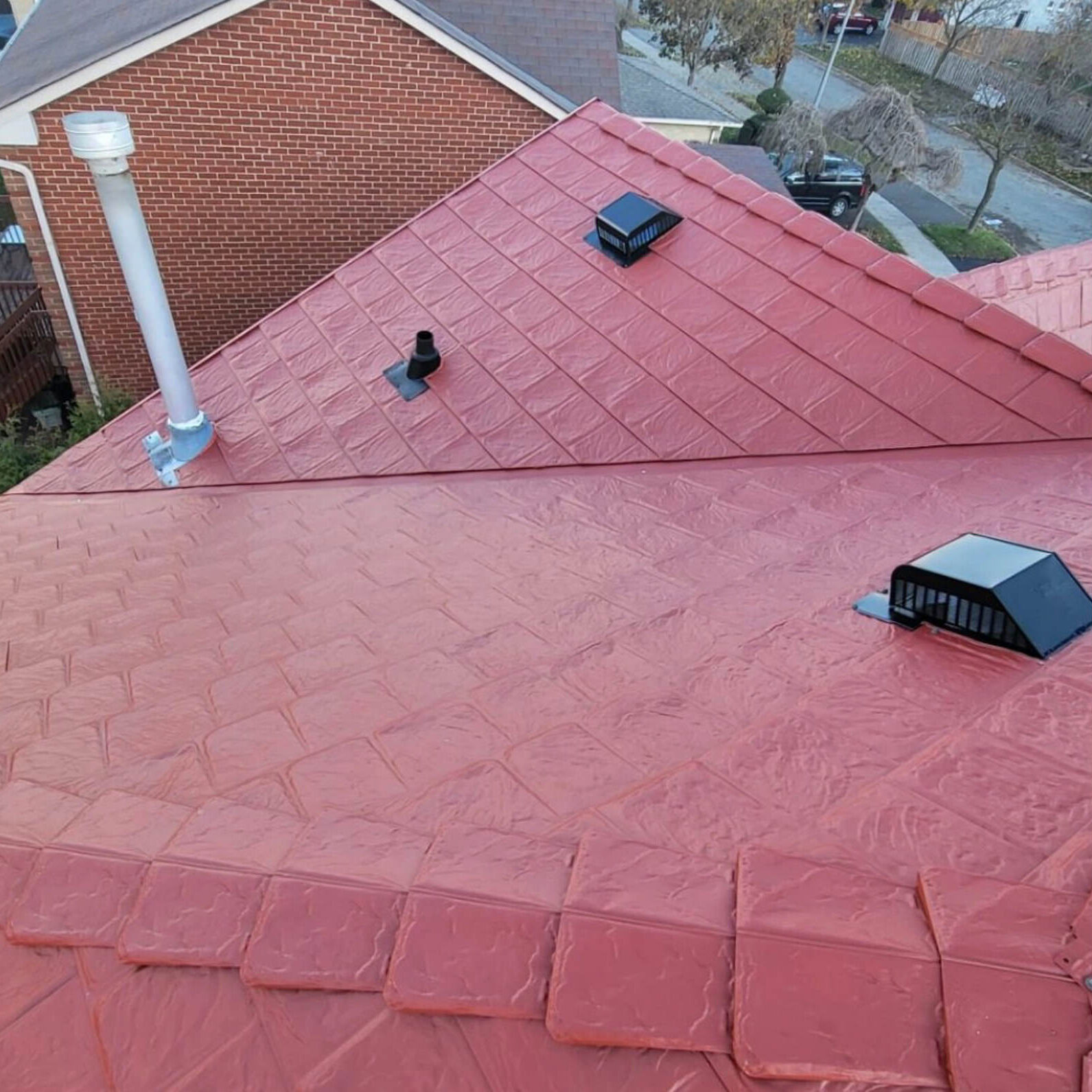 close up of completed red metal roof