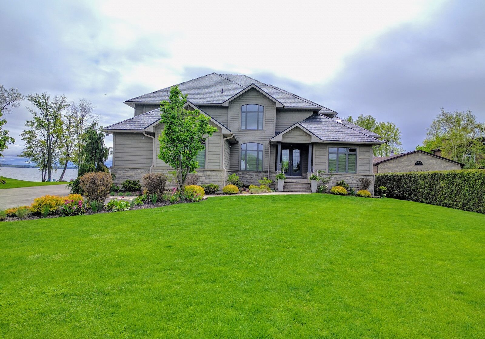 Metal roof install stone colour completed project in Northern Ontario