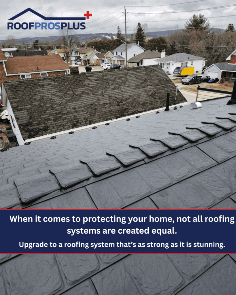 Close-up view of a dark grey metal roof in the foreground with asphalt-roofed houses and trees in the background. The RoofProsPlus logo is in the top left hand corner and the text "When it comes to protecting your home, not all roofing systems are created equal" is at the bottom.