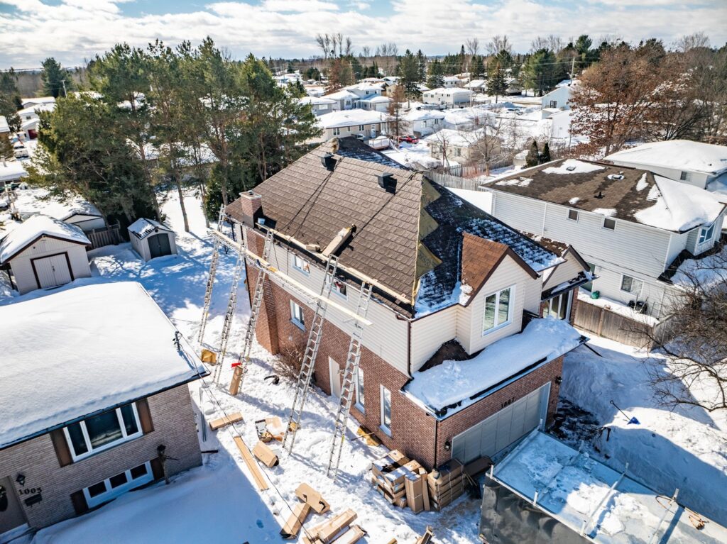 Metal roofing system installation in the Ontario winter by Roof Pros Plus