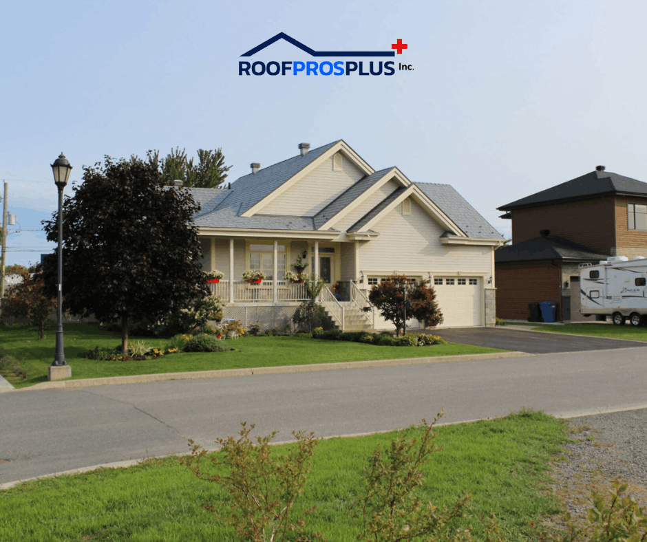 A suburban house with a metal roof, well-maintained lawn, blooming flowers, and a porch are in view. The blue sky and street create a peaceful, inviting atmosphere. The RoofProsPlus Inc. logo is at the top.
